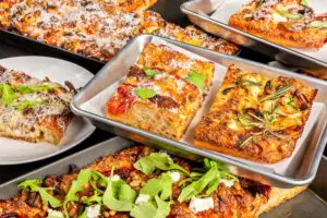 Up close shot of various Dohlio pizza